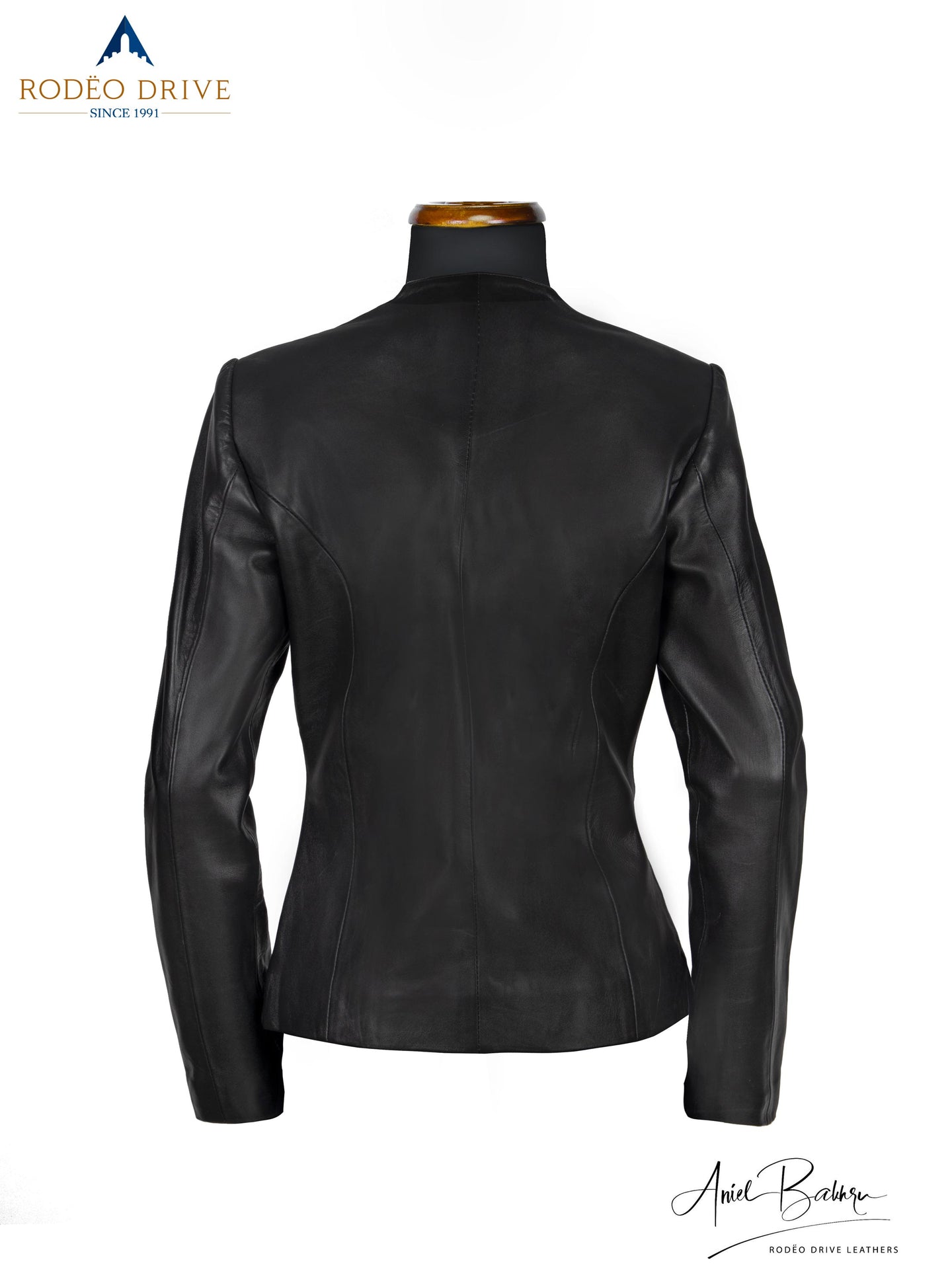 back side image of black CLASSIC CHANNEL JACKET. turtle neck is visible