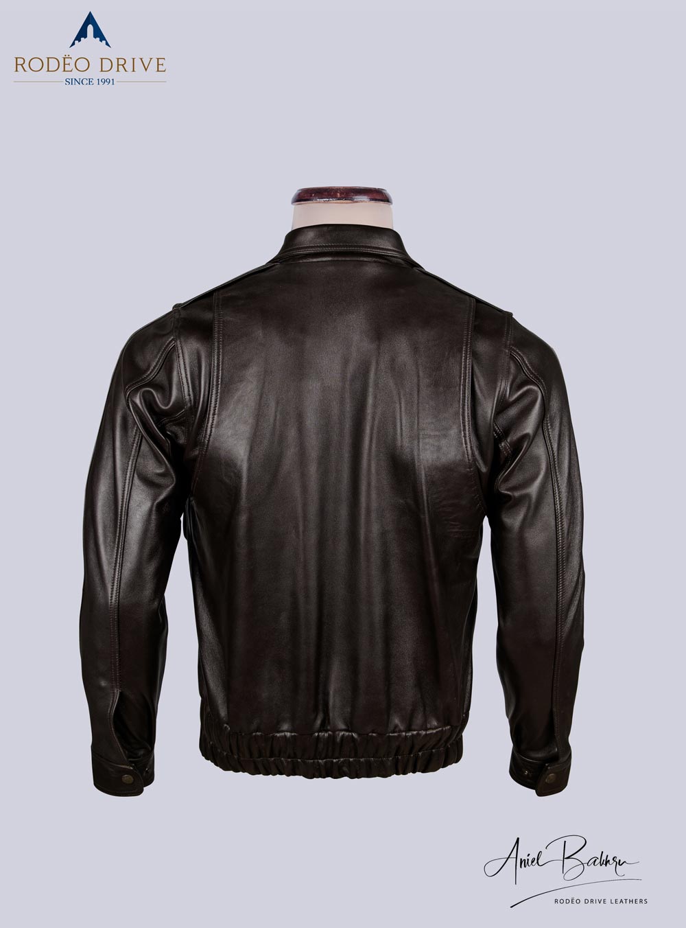 back side image of BROWN UNIFORM LEATHER JACKET for MEN displayed on mannquin