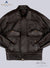 Front image of brown LEATHER JACKET for  MEN. Hands of jacket are tucked inside slit pockets. other two pockets have buttoned straps