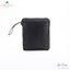 Back sideview of black COLLAPSIBLE BACKUP CHECKIN BAG. Side zip visible