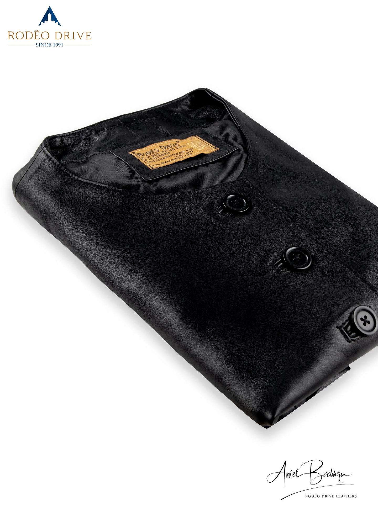 Folded image of black CLASSIC CHANNEL JACKET. It has crew neck