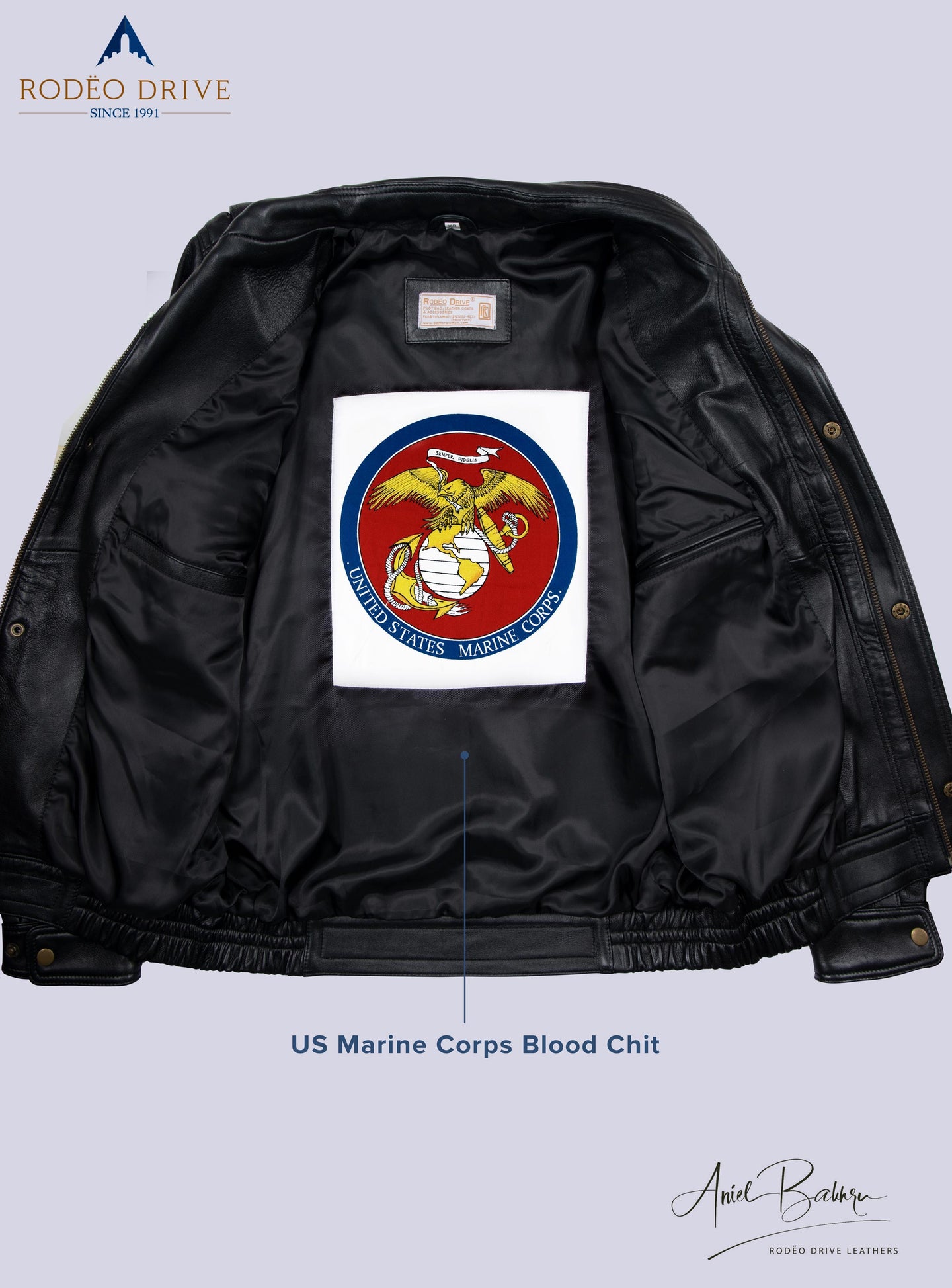 Image of inside part of Bomber short jacket, A USA marine corps blood chit s sewed inside.
