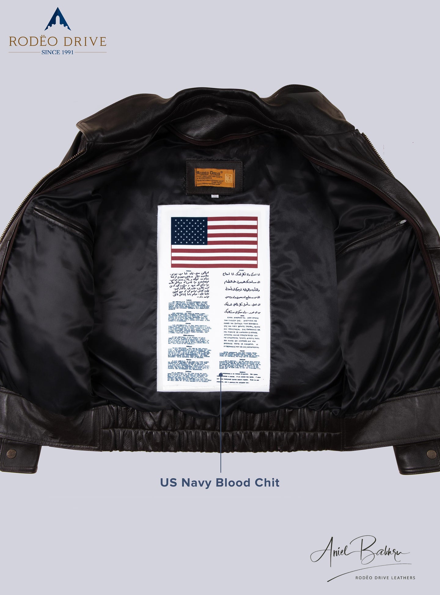 Inside image of BROWN UNIFORM LEATHER JACKET for MEN. US Navy Blood chit is sewed inside it.