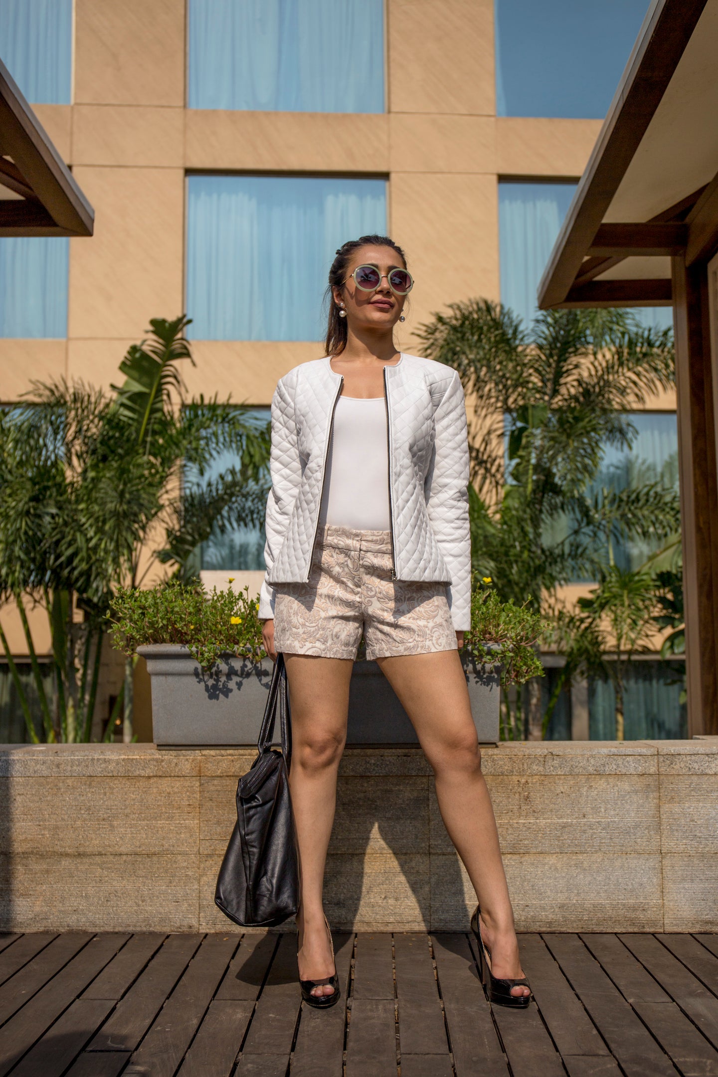 Female model posing with CHANNEL DIAMOND STITCH JACKET