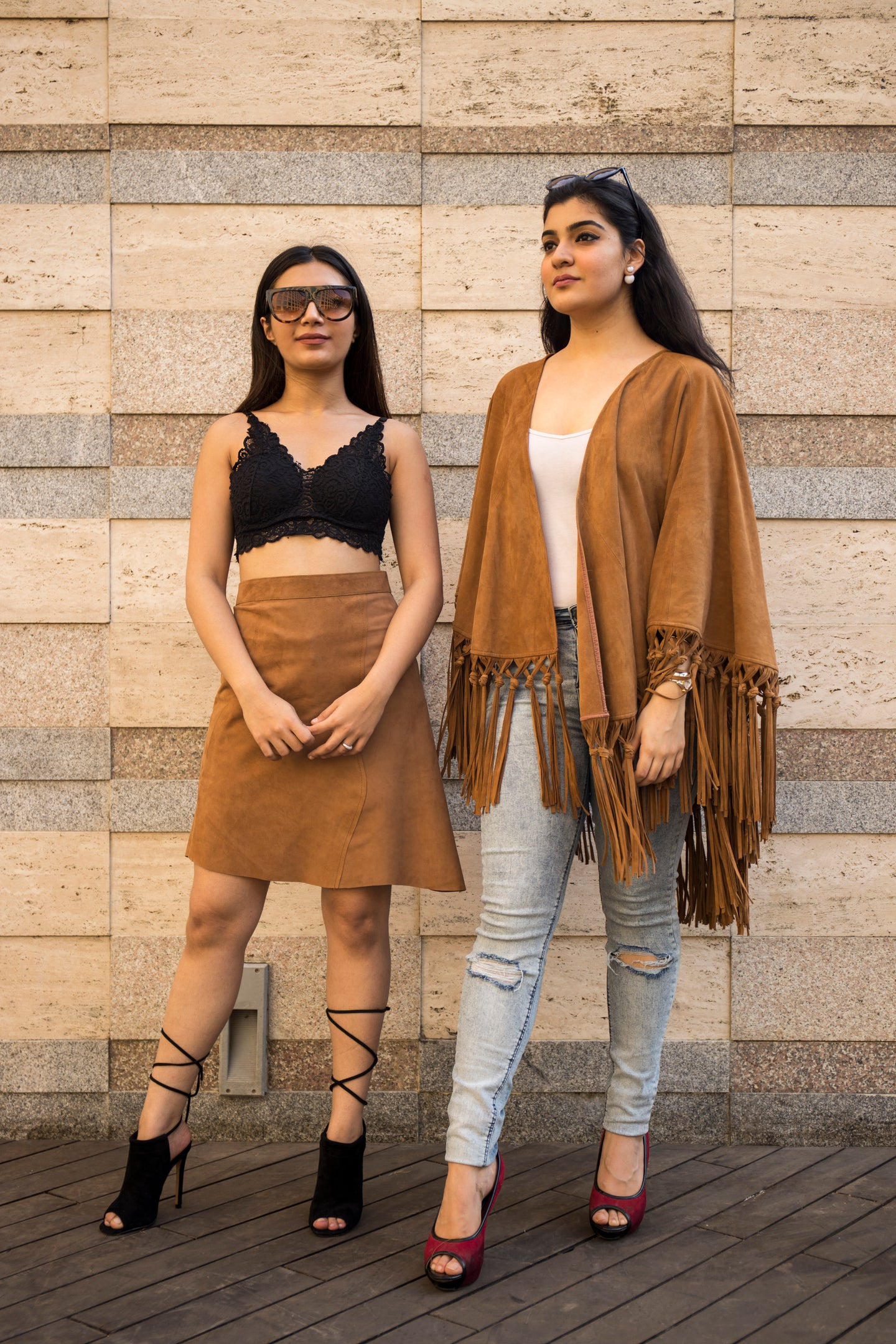 Leather ponchos full look on a female model