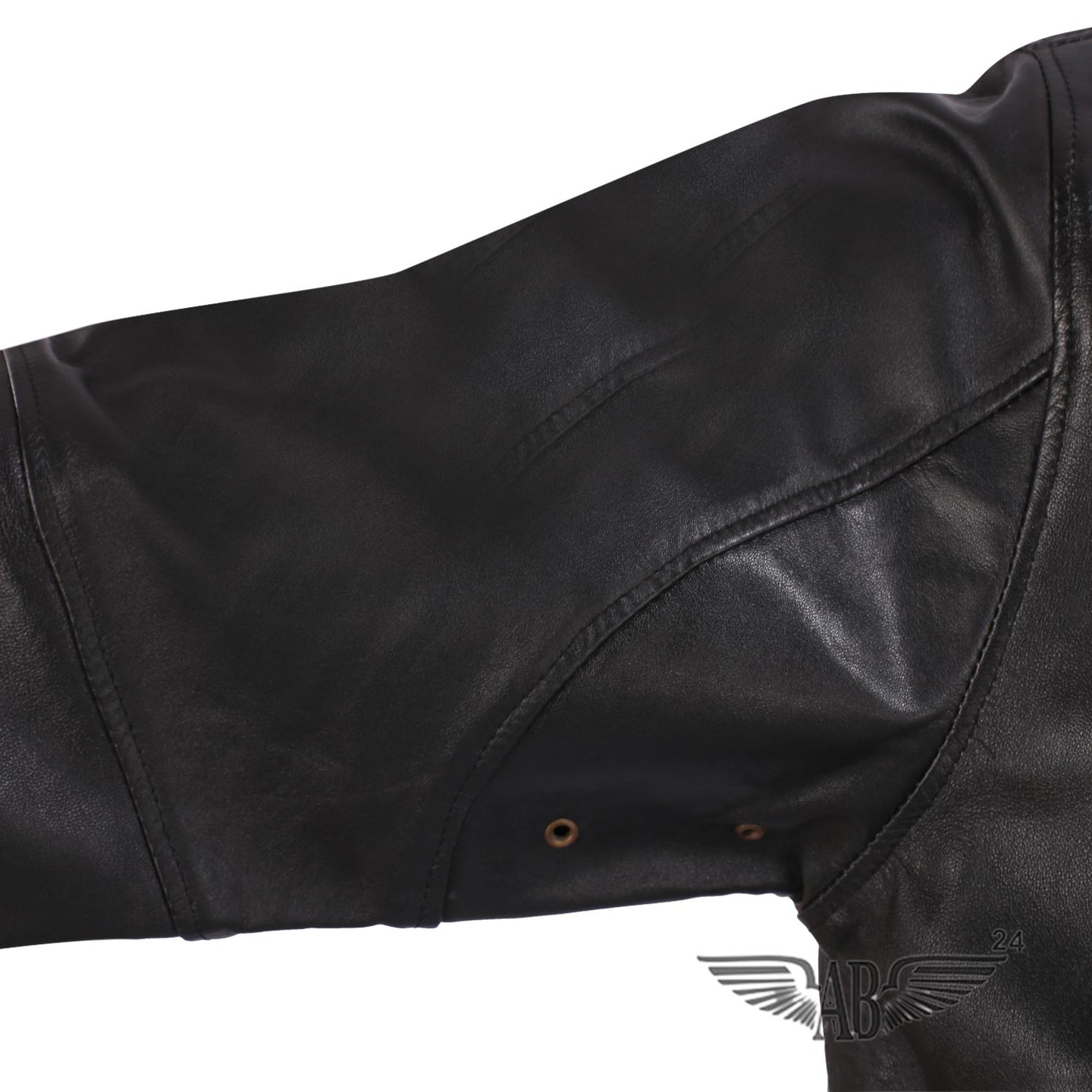 Image of arm and arm pit of Bomber jacket. two tiny openings make it breathable