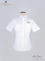 Front image of white Standard Women's Pilot shirt. It is displayed on a mannequin