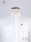 Close image of white Pilot Shirt. Shirt is buttoned. a pen tucked inside one pocket.