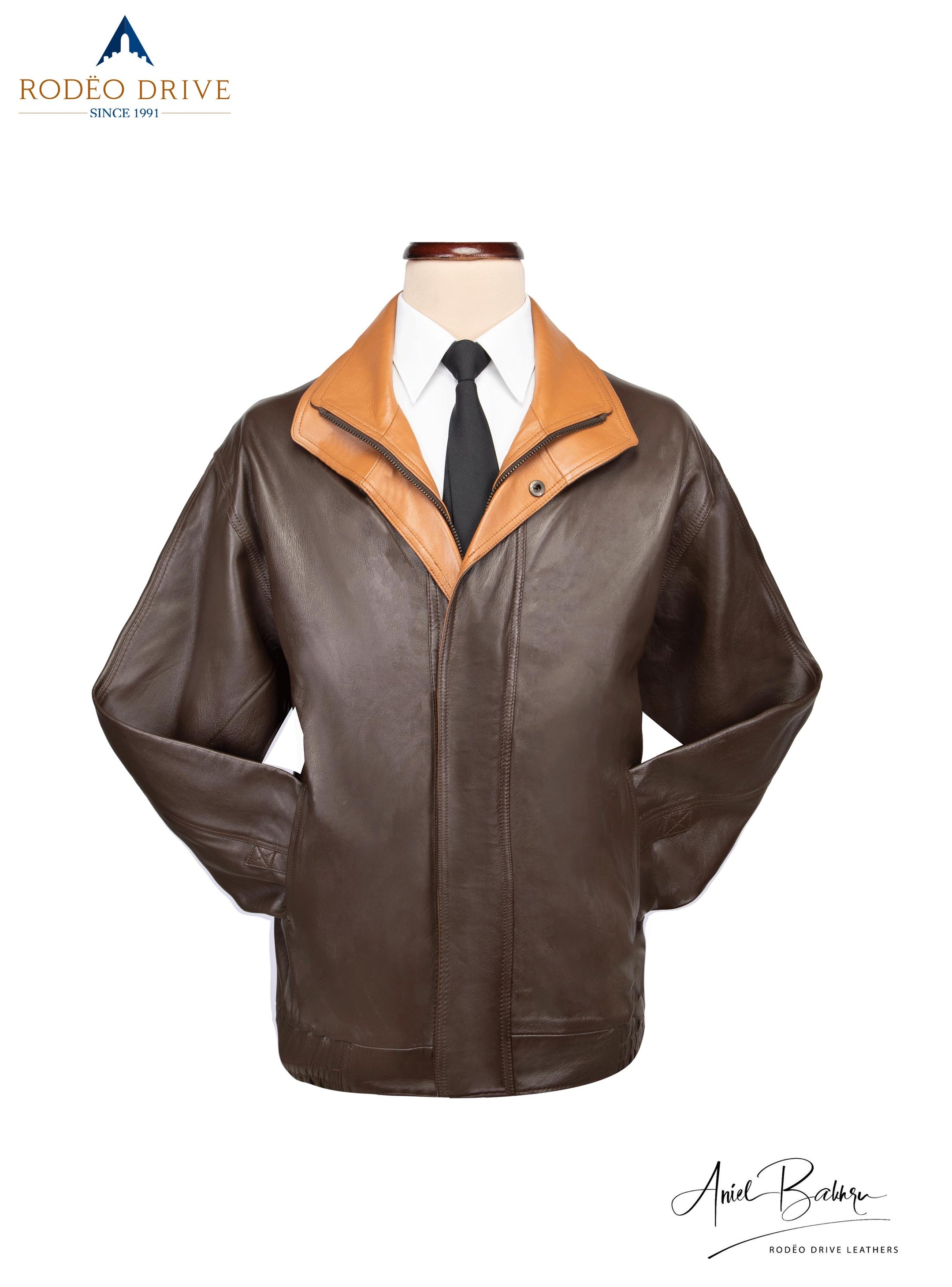 Image of 2 color Bomber Jacket  over white shirt with a neck tie on a mannequin.