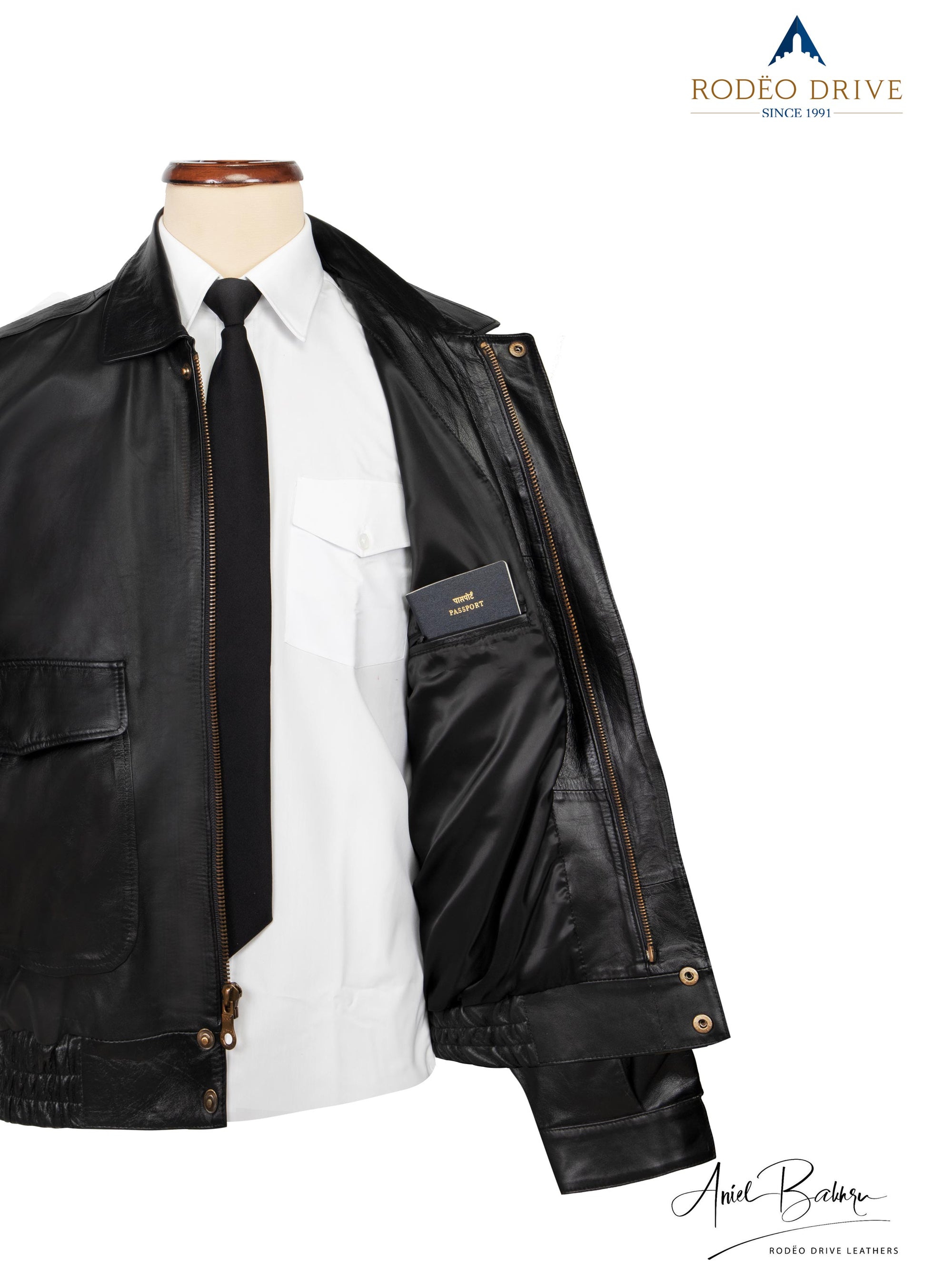 image of ARMY HELICOPTER BOMBER JACKET on a mannequin. A white shirt is tucked in. A neck tie is visible. 