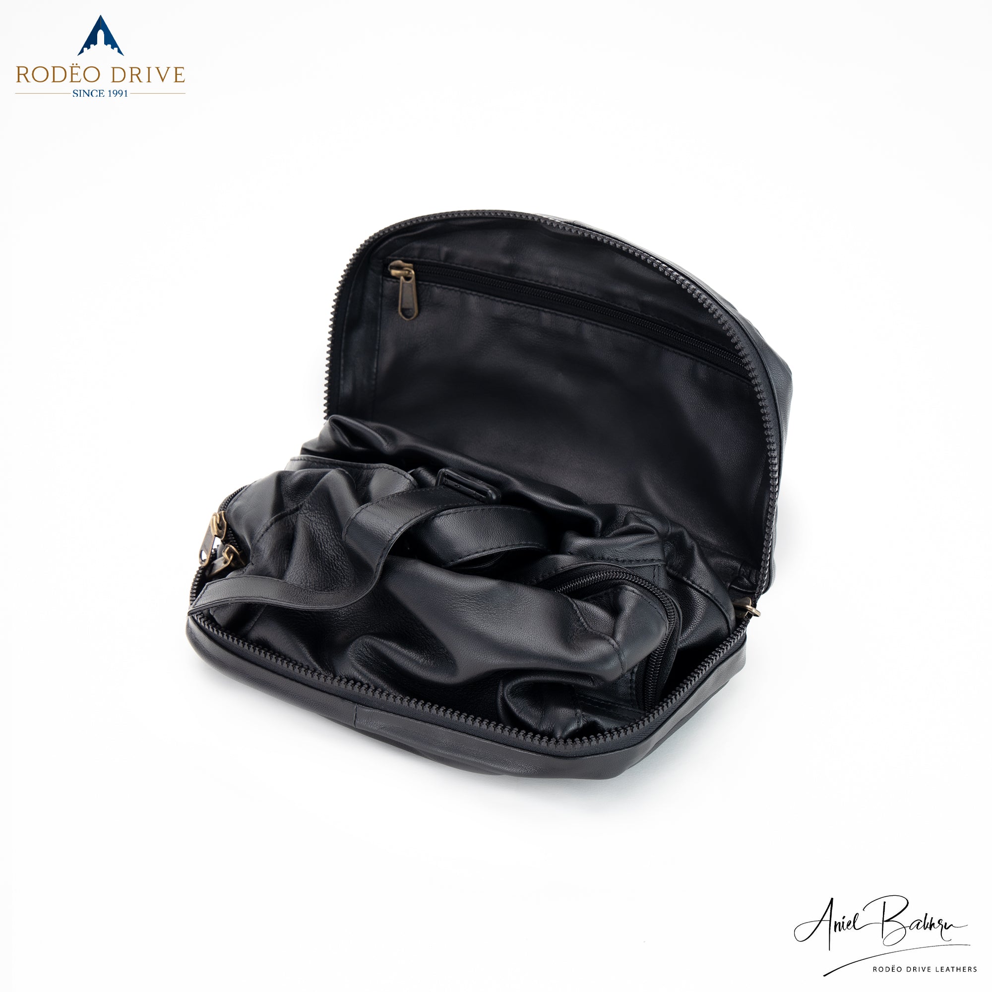 inside image of COLLAPSIBLE LEATHER BACKPACK. side zip visible