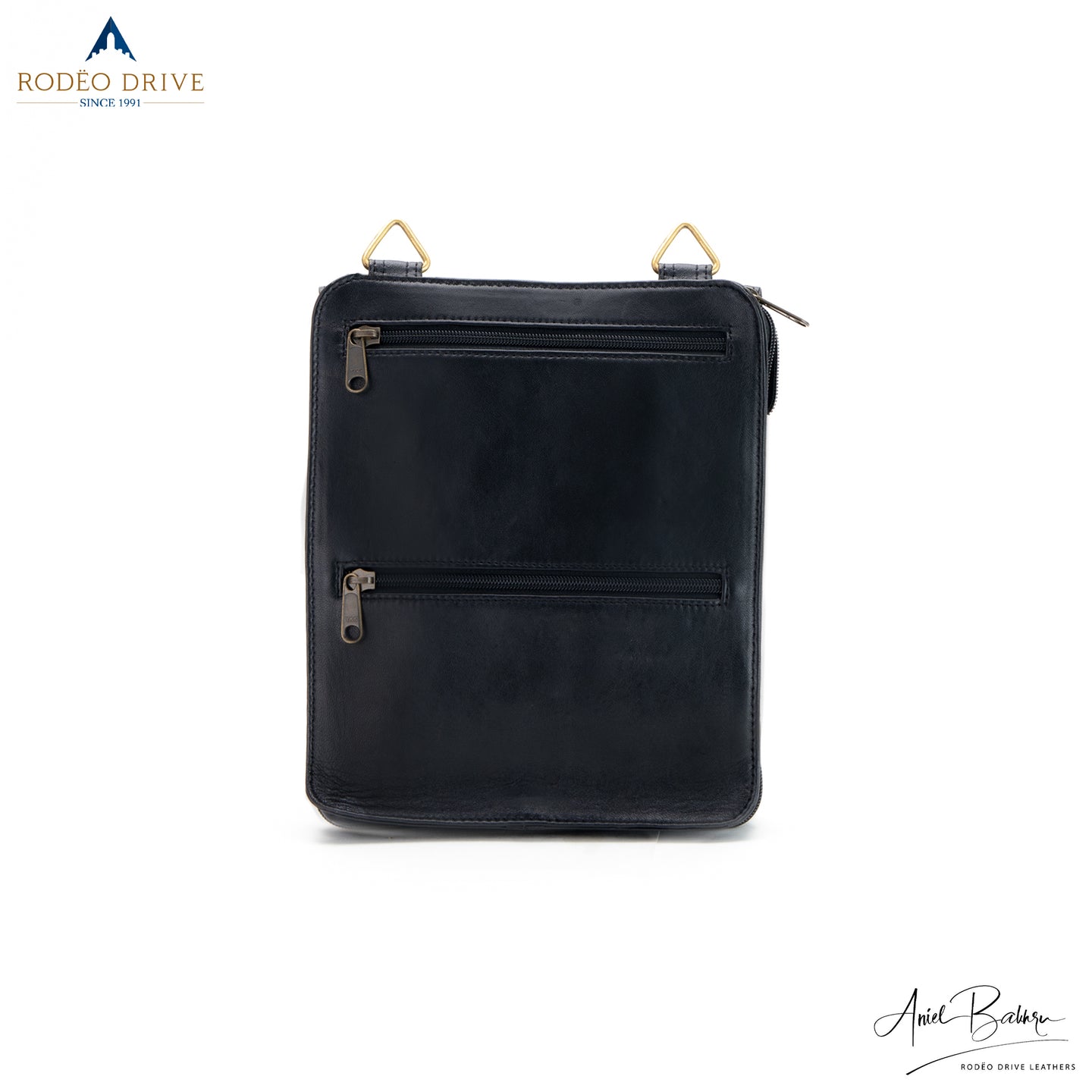 Front image of black  collapsible purse merce tote.  The front cover of bag is lifted up. Two zips visible.