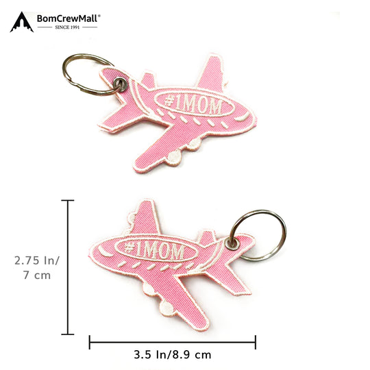 Pink colour bag tag with #1 MOM written on it.