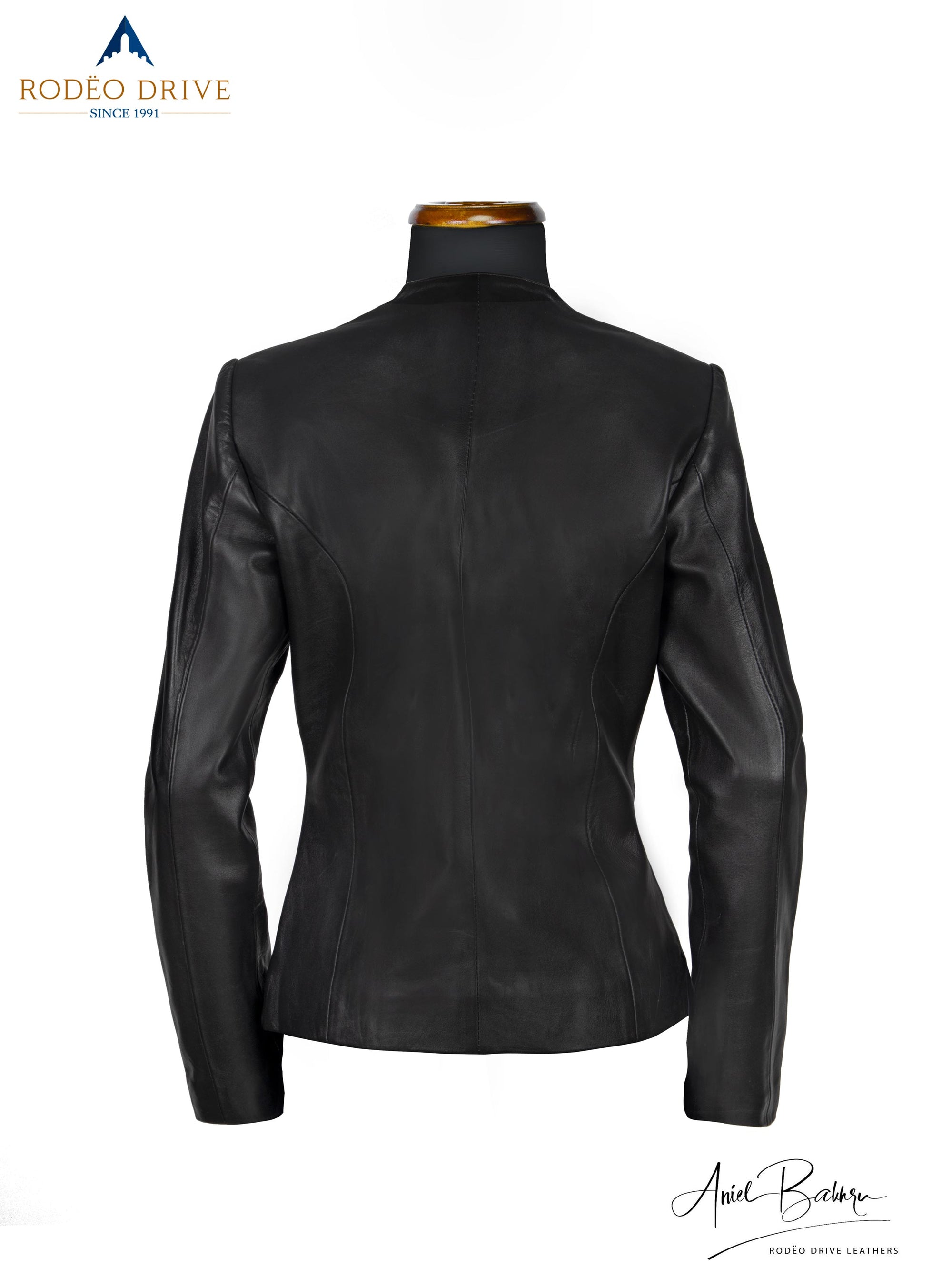back side image of black CLASSIC CHANNEL JACKET.  turtle neck is visible