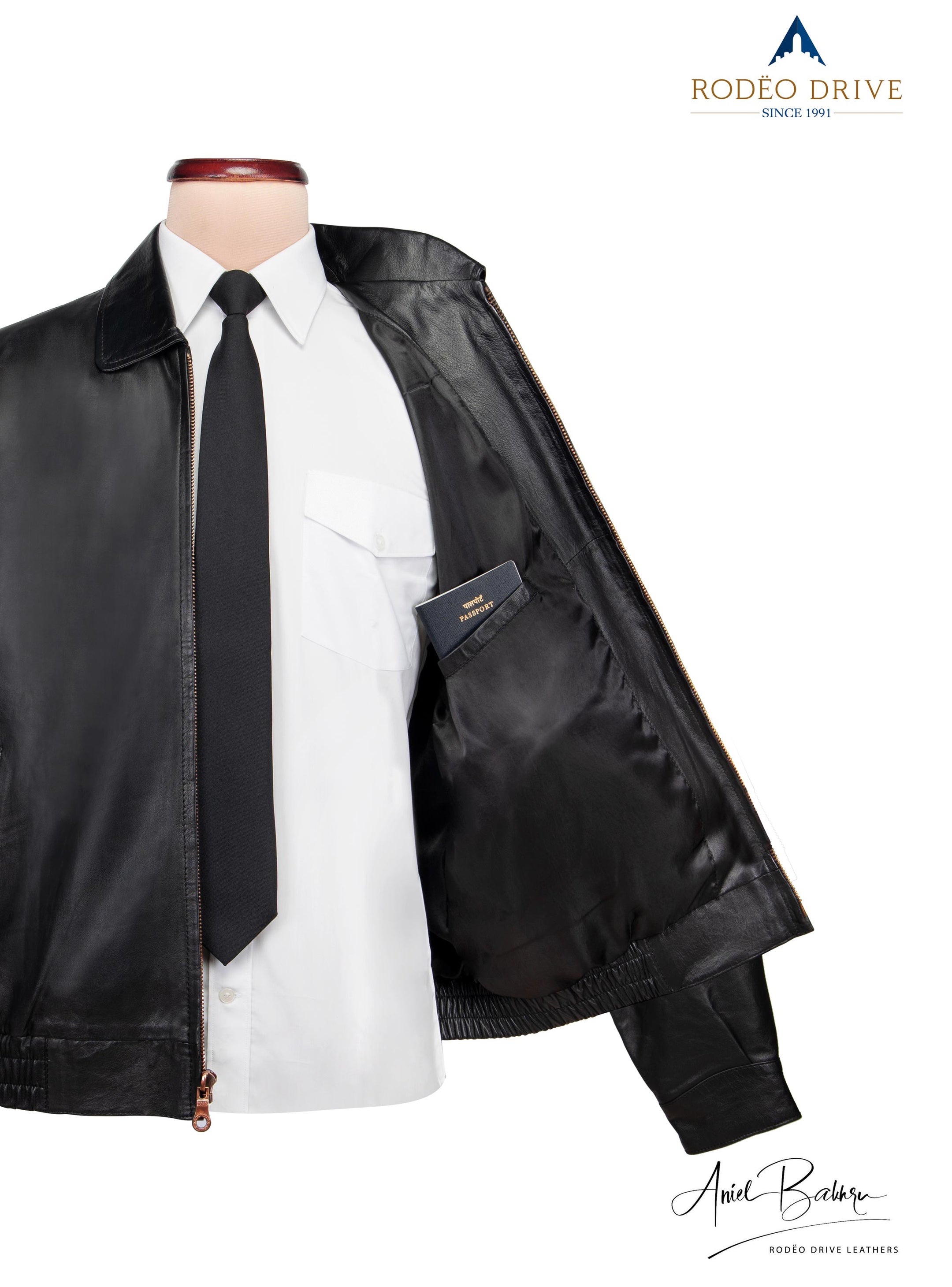 Inside pocket image of Bomber jacket. A passport is tucked  in it.