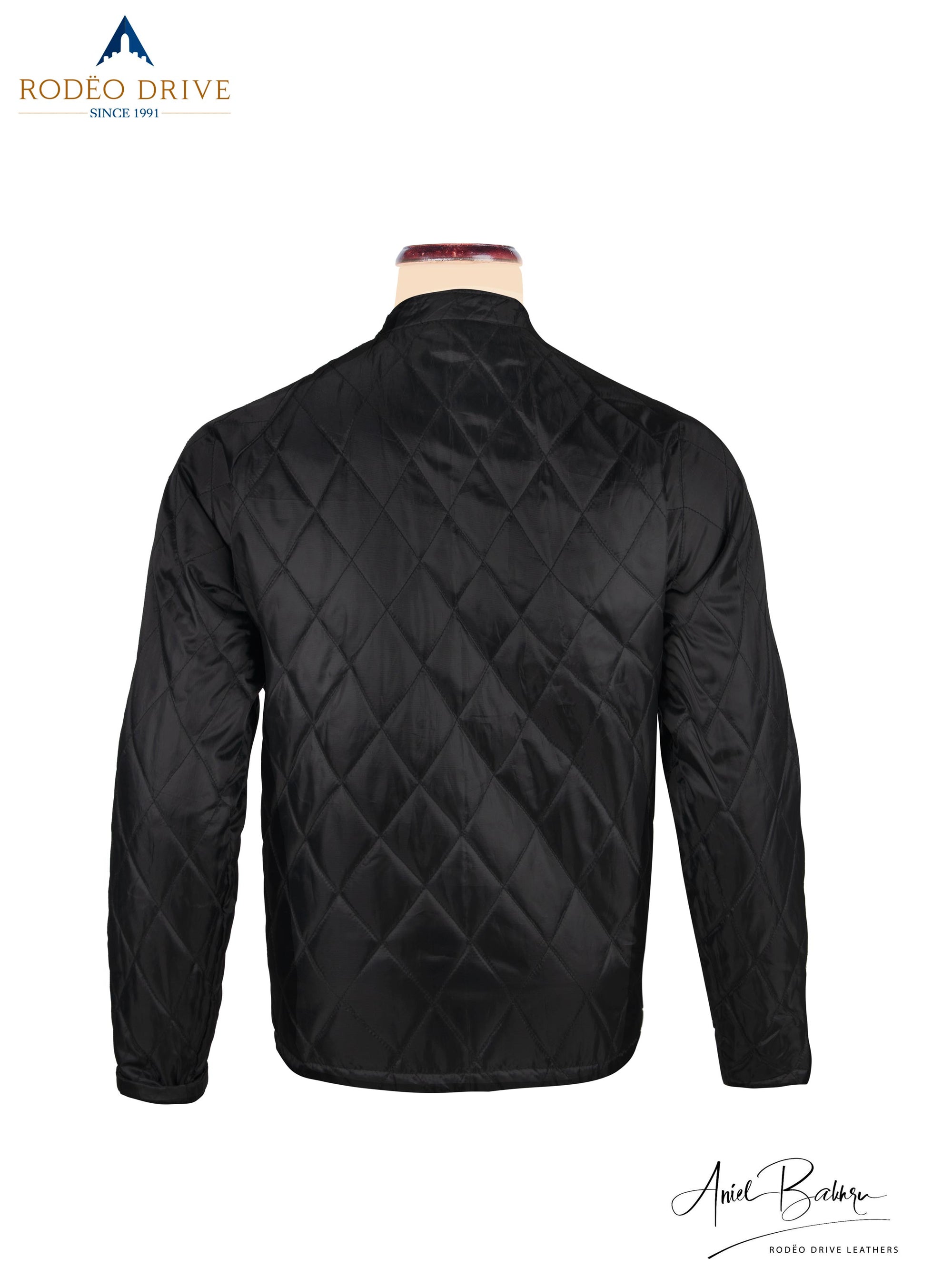Back side image of black patterned leather  Jacket.