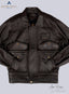 Front image of brown LEATHER JACKET for  MEN. Hands of jacket are tucked inside slit pockets. other two pockets have buttoned straps
