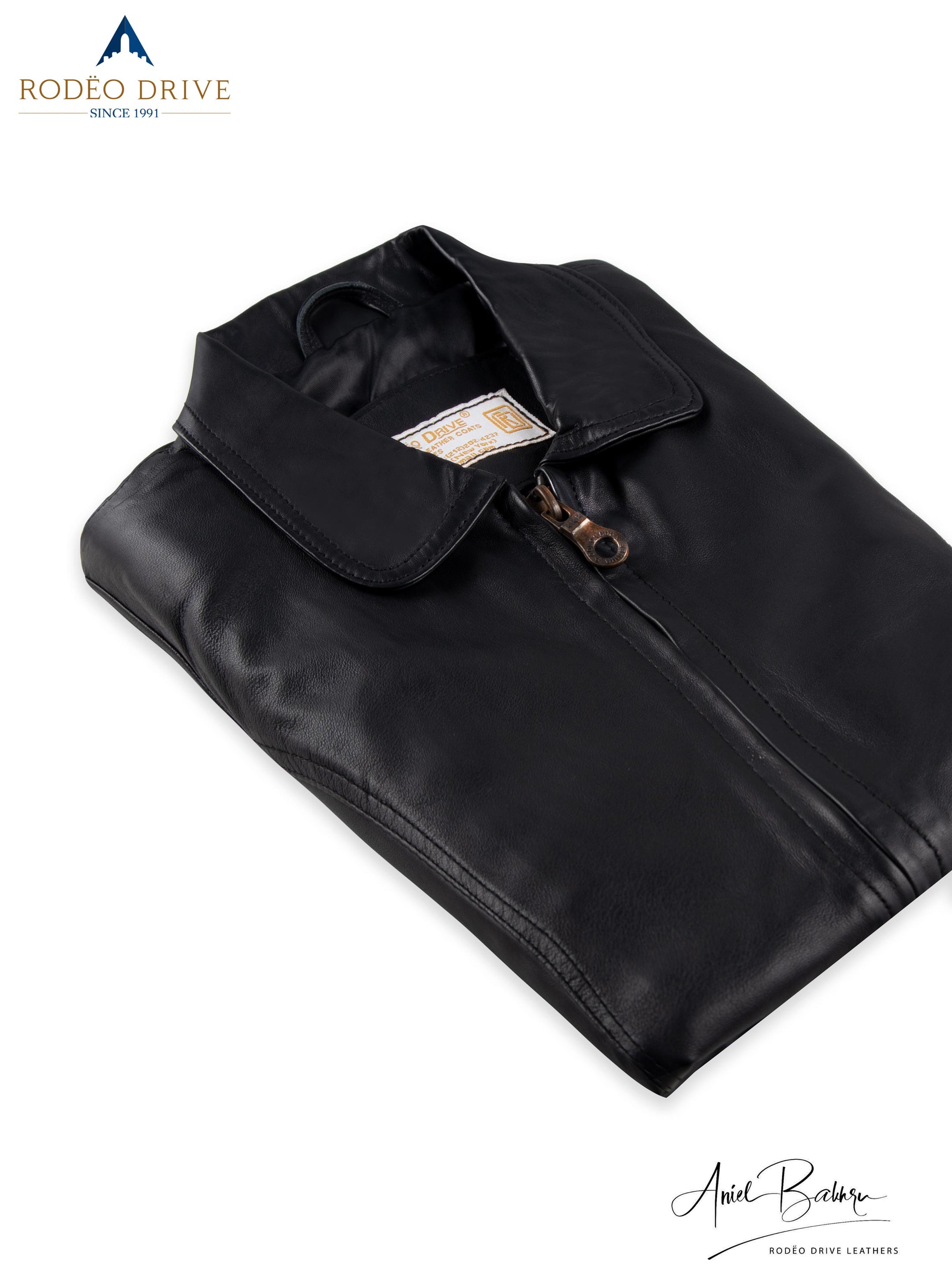 Folded image of  black TRENCH COAT