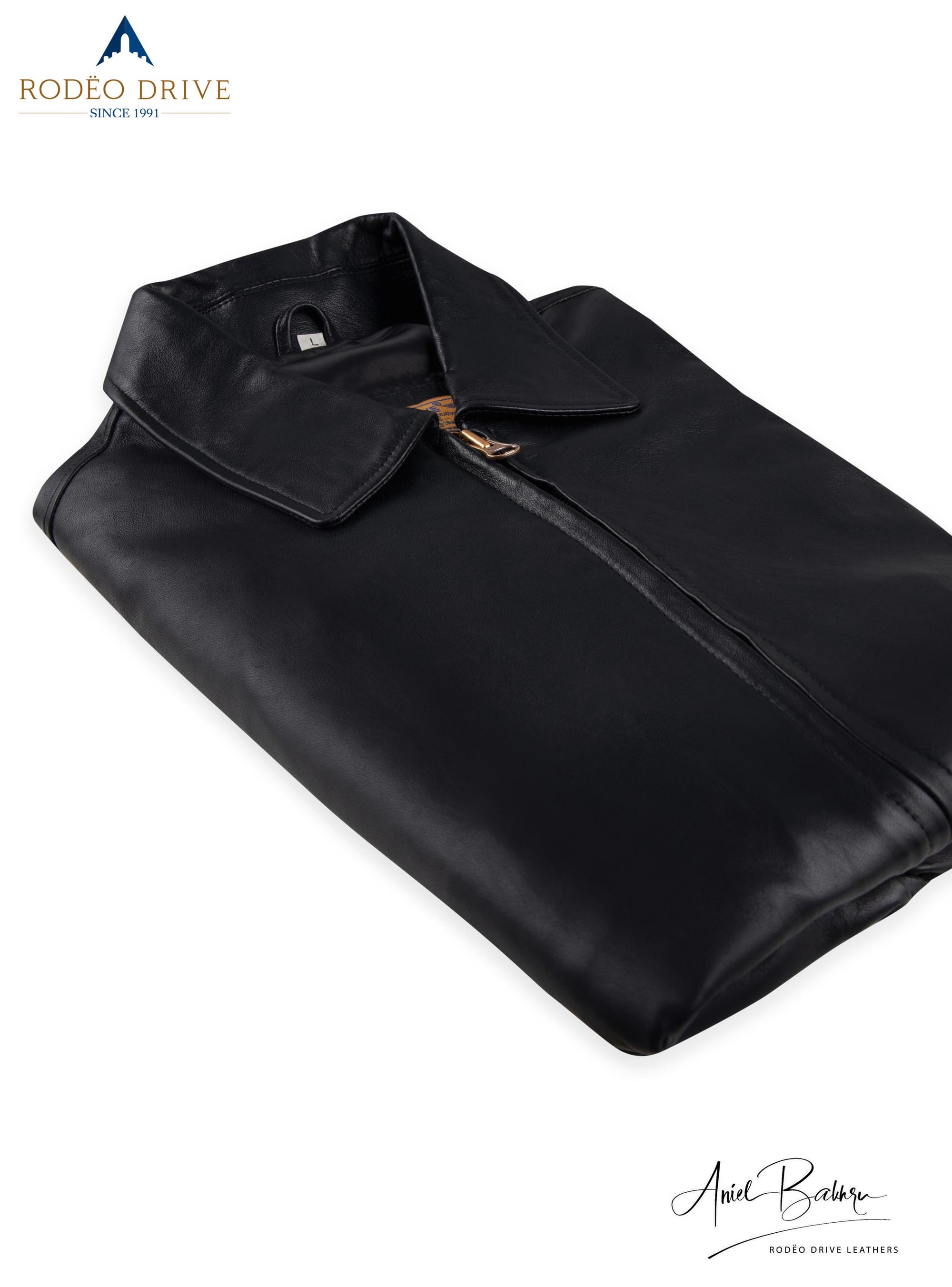 Folded image of black leather jacket. It appears elegant.