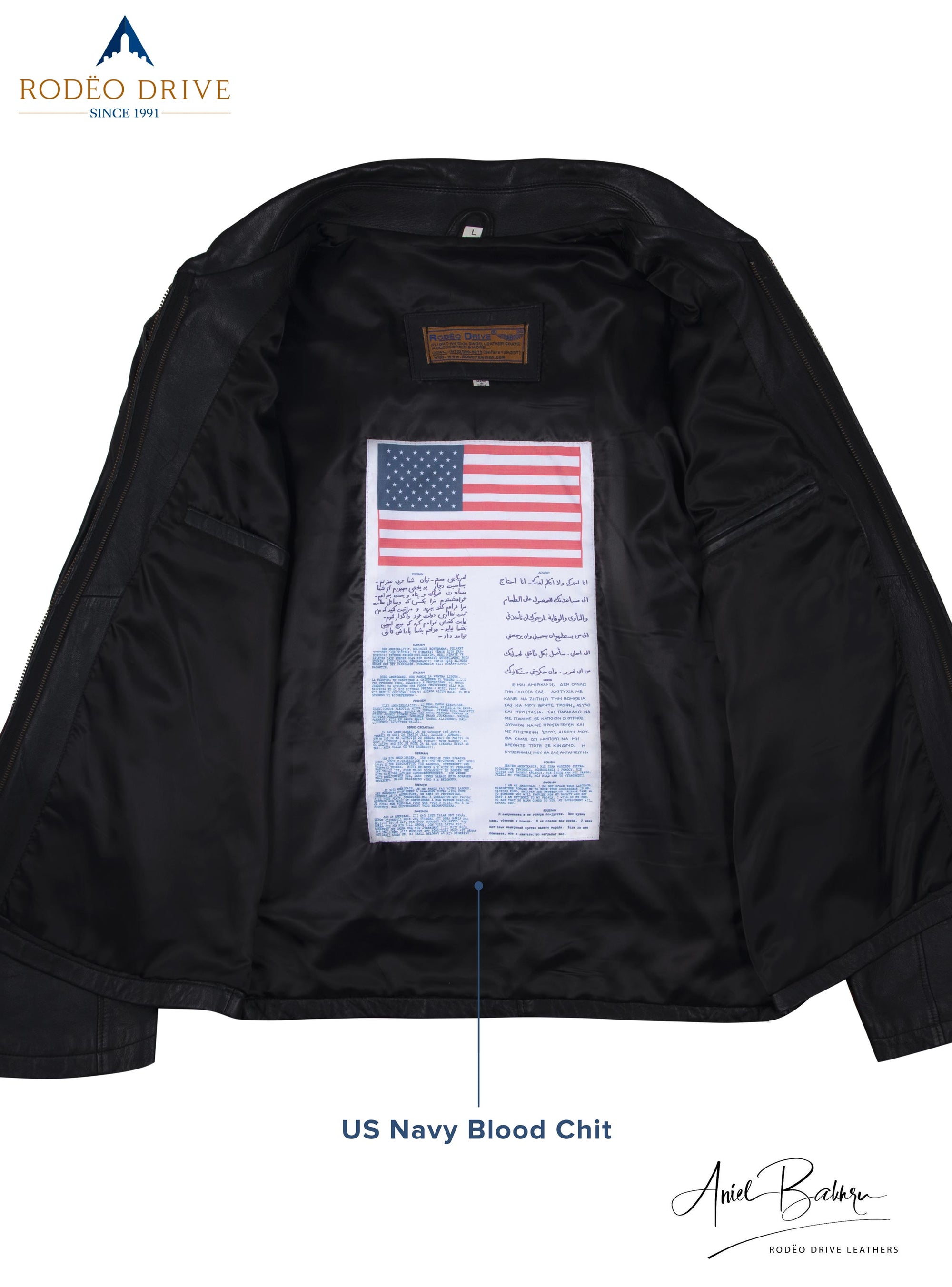 inside image of black leather jacket. A US navy Blood chit is sewed inside it