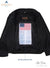 inside image of black leather jacket. A US navy Blood chit is sewed inside it
