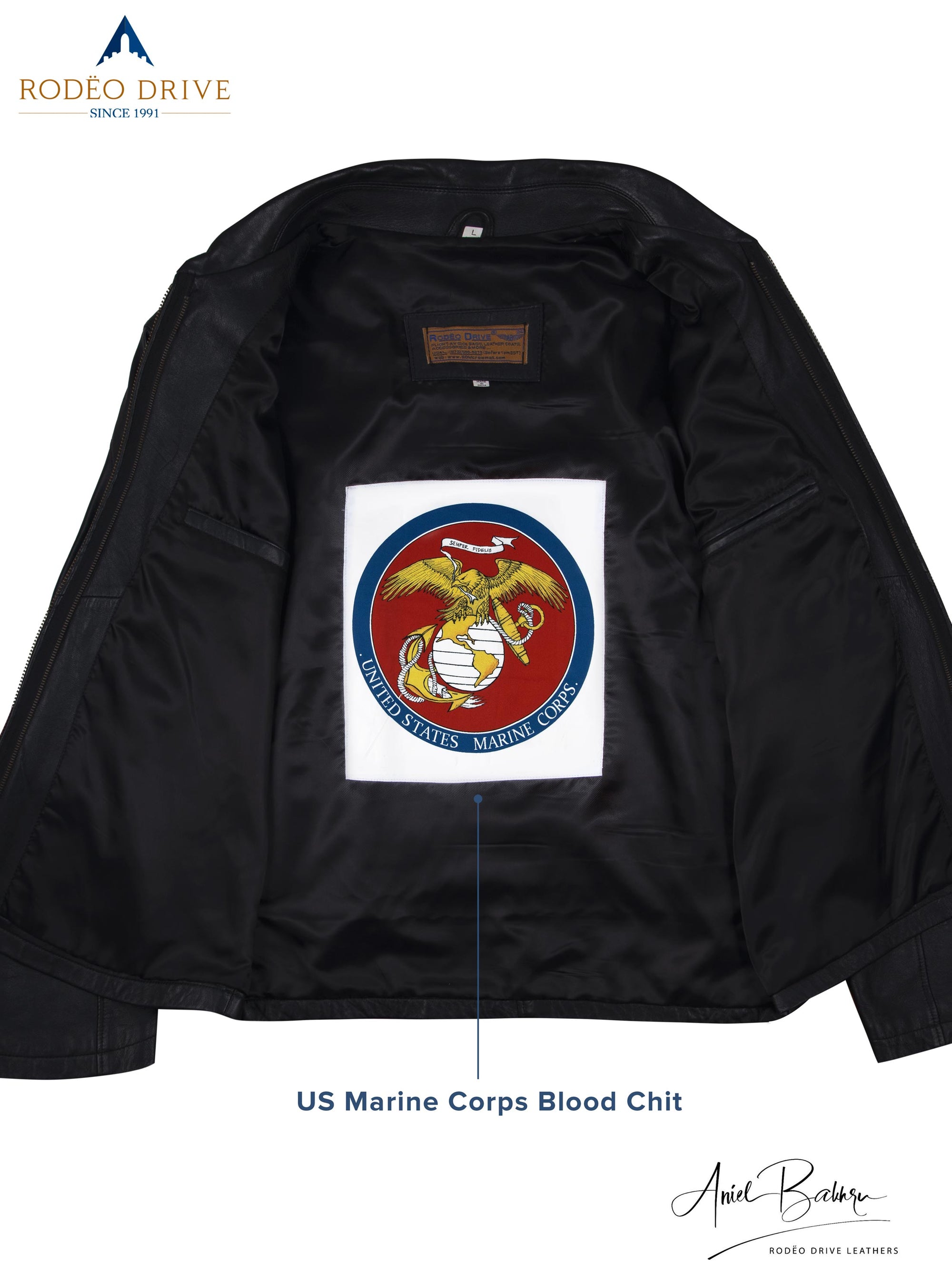 inside image of black leather jacket. A US marine corps Blood chit is sewed inside it