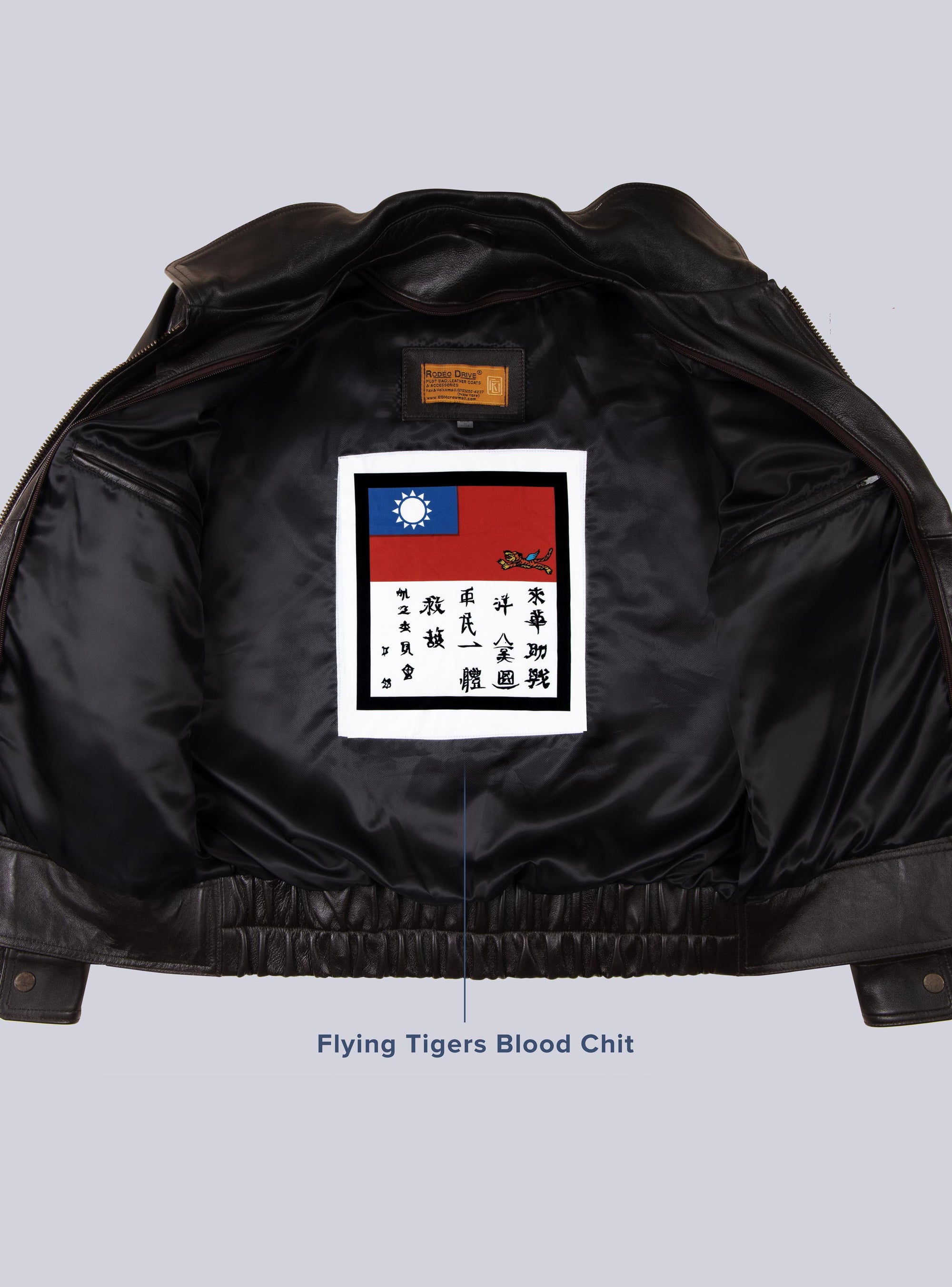 inside image of UPS BROWN  LEATHER JACKET for WOMEN. A flying tigers blood chit is sewed inside it.
