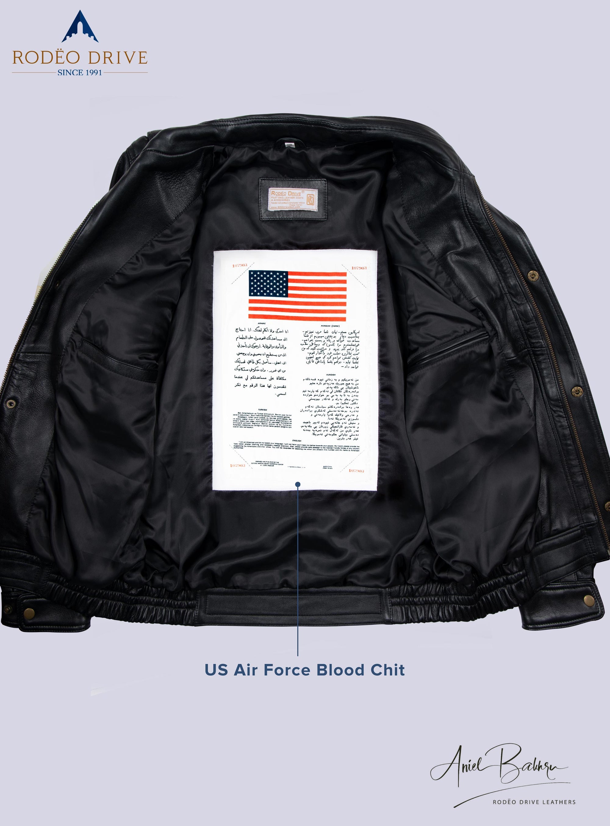 Image of inside part of Bomber short jacket,  A USA Force Blood chit is sewed inside.