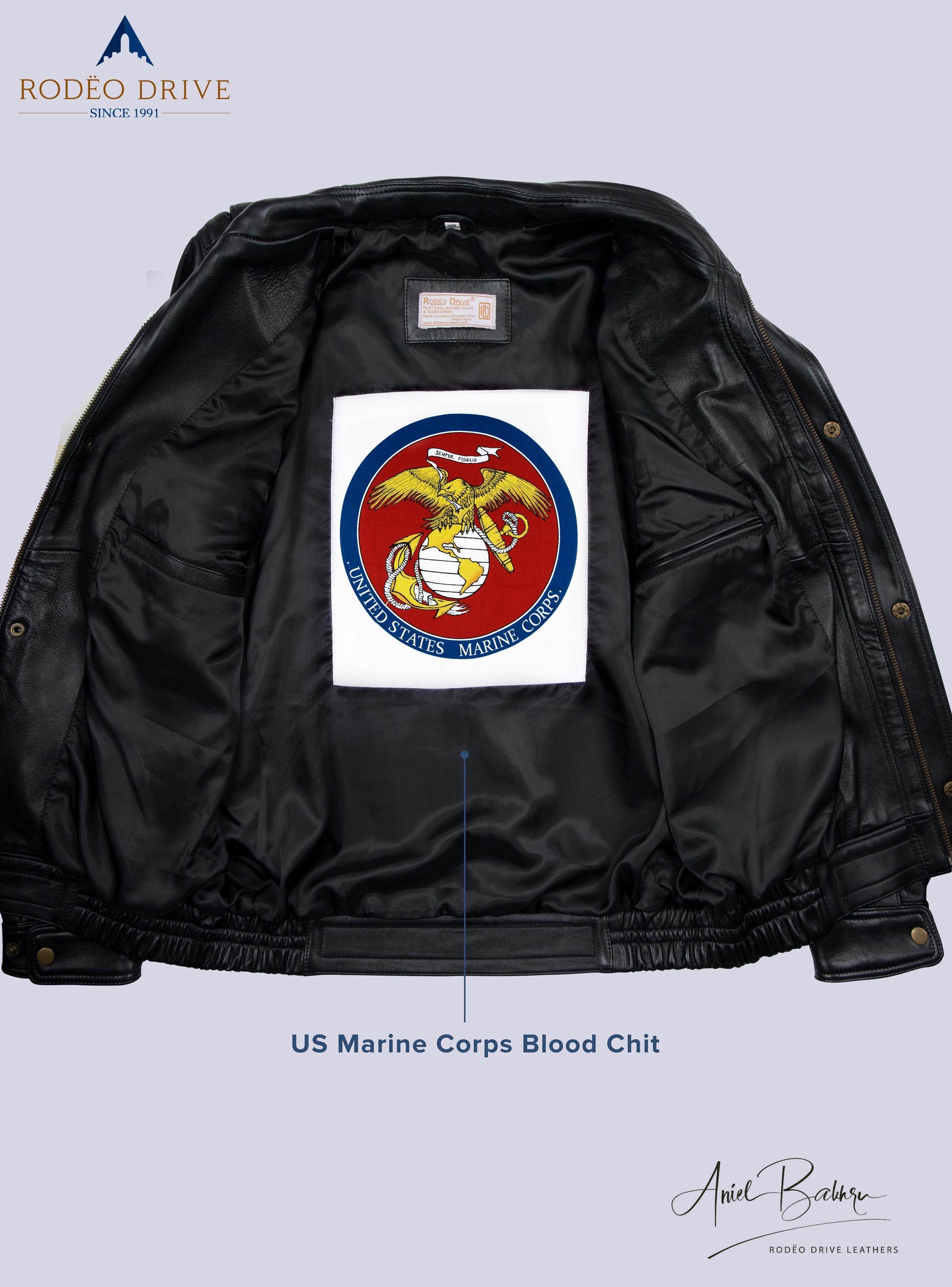 Image of inside part of Bomber short jacket,  A USA marine corps blood chit  s sewed inside.