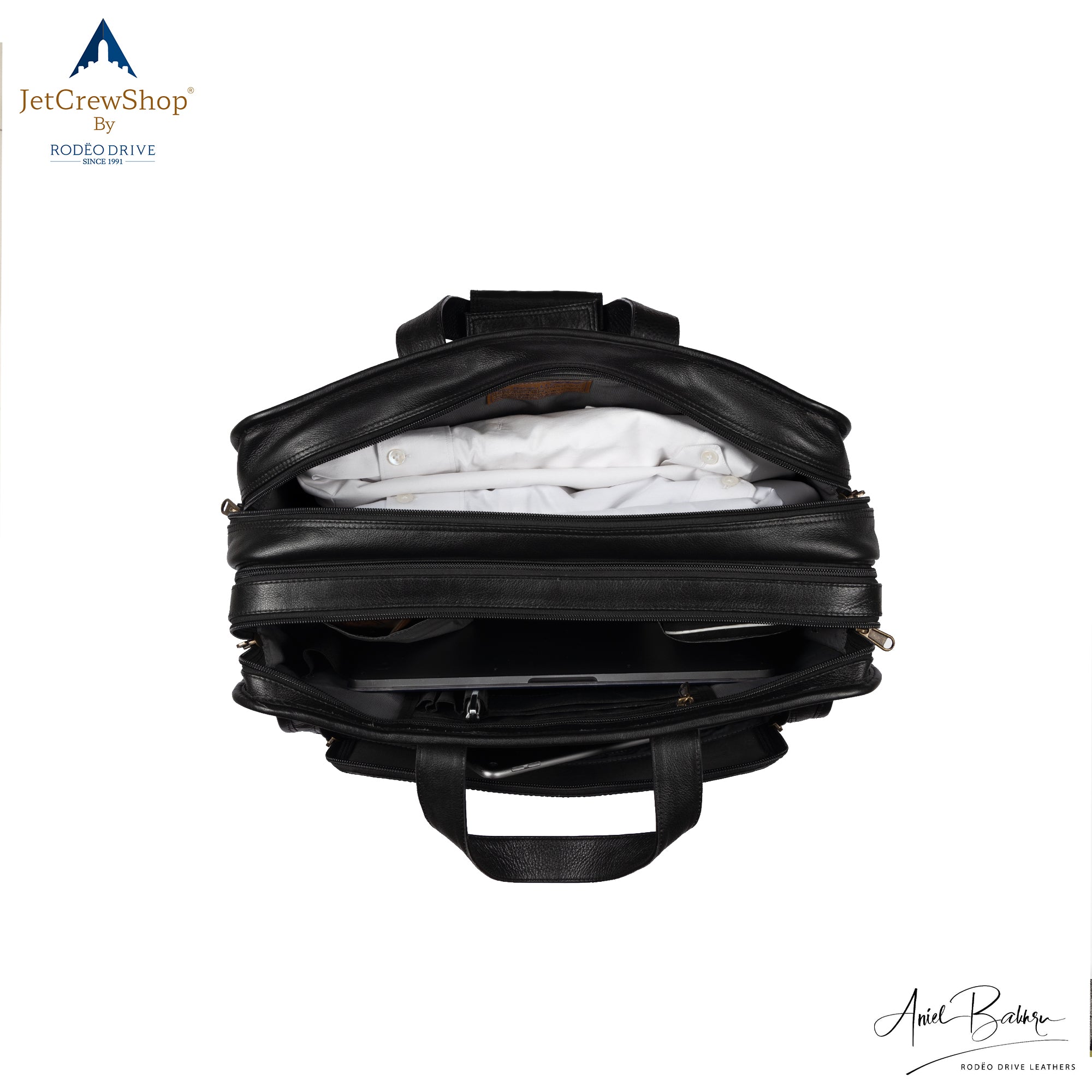 Inside image of open PILOT BAG. Luggage is inserted in bag.  Spacious bag.