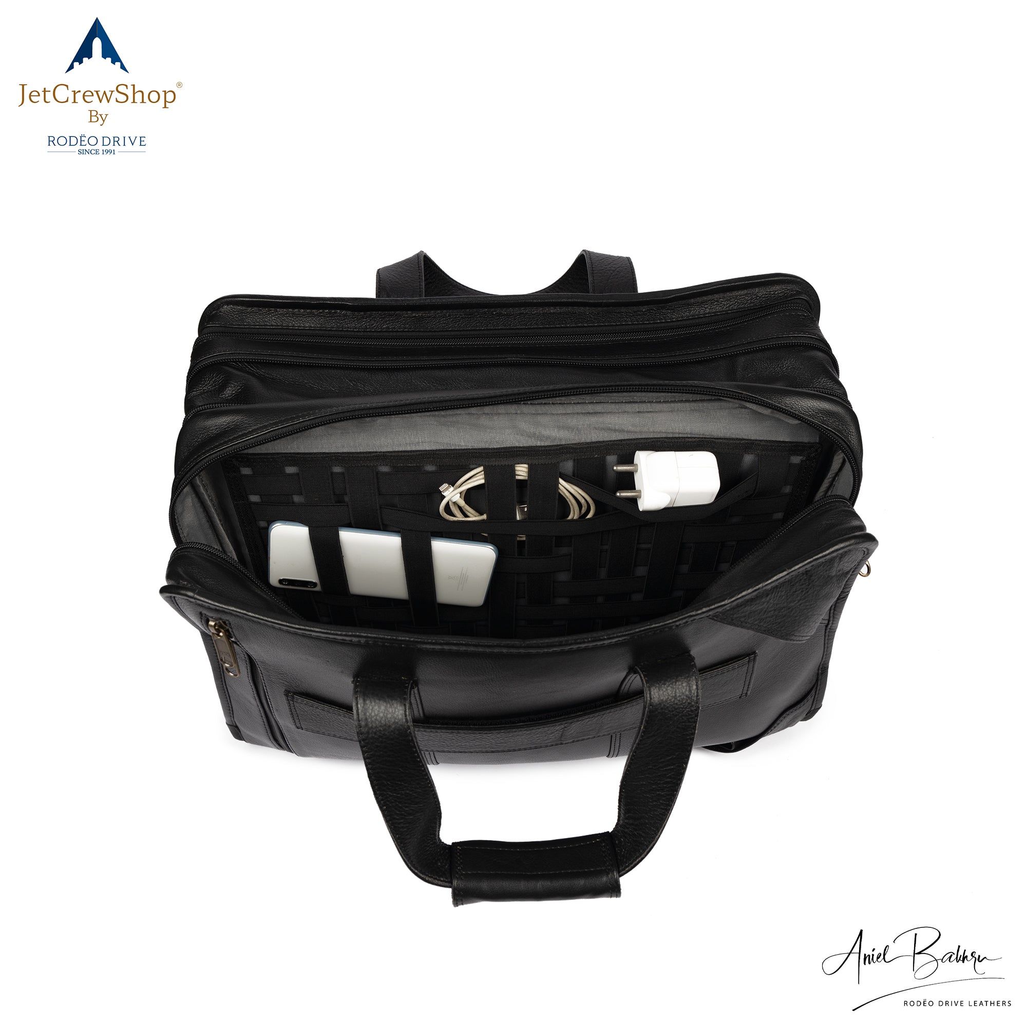 Inside image of last compartment  of PILOT BAG. Electronic devices are neatly tucked inside