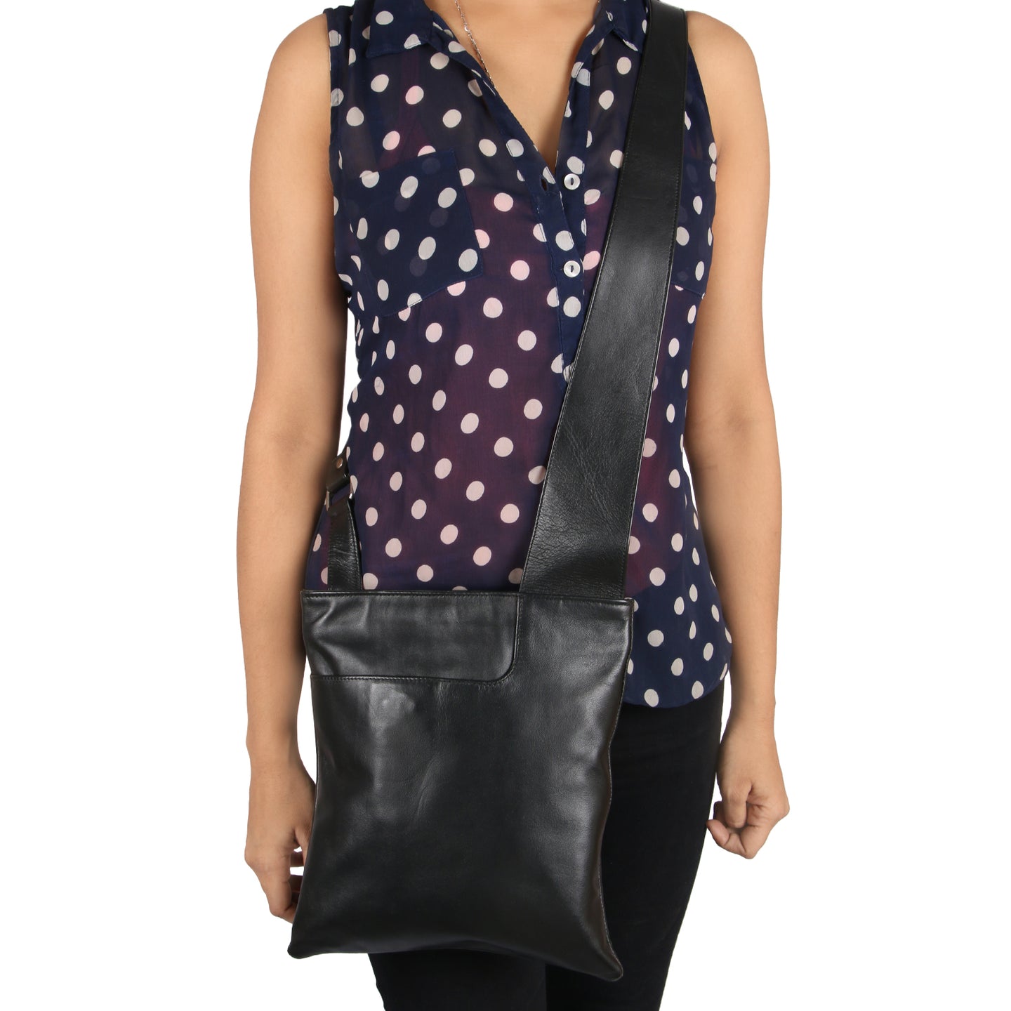 Image of model posing with FLAT CROSS BODY HAND BAG. It appear stylish.