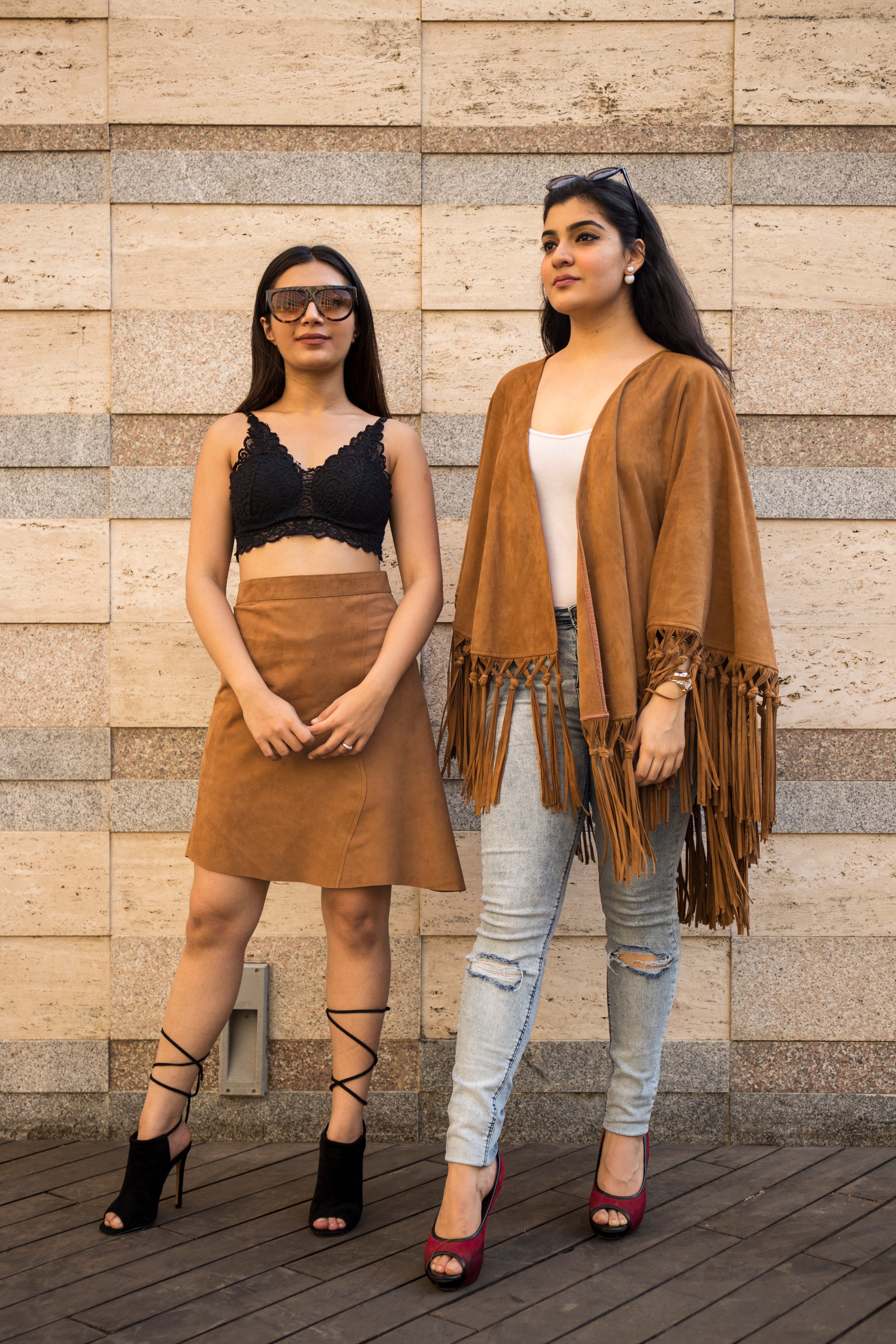 Leather ponchos full look on a female model