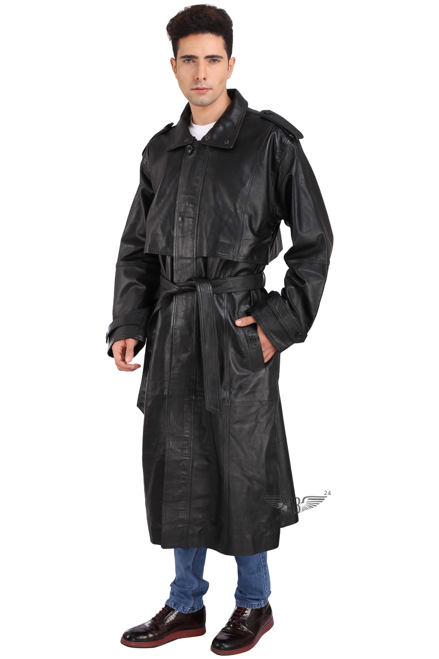 Side angle view of TRENCH COAT. A model is posing  with it on  him