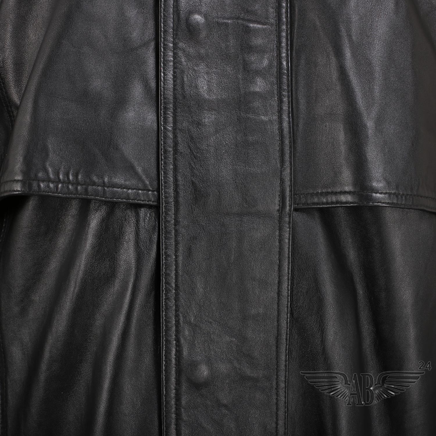 Close view of black TRENCH COAT, It is neatly buttoned