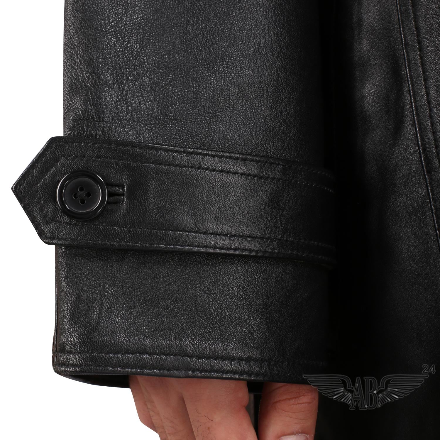 Image of hand cuff  of TRENCH COAT. It is  buttoned.