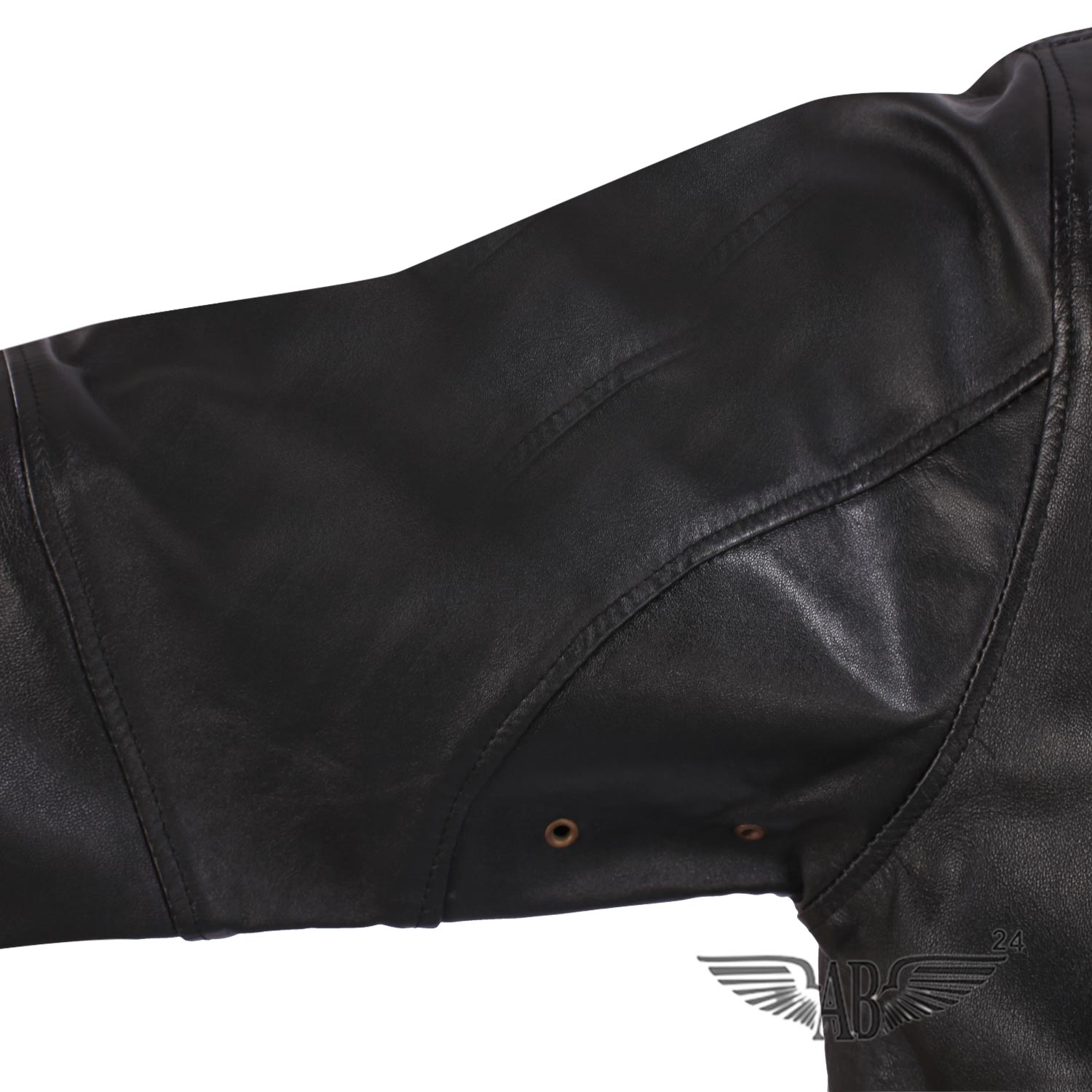 Image of arm and arm pit of Bomber jacket. two tiny openings make it breathable