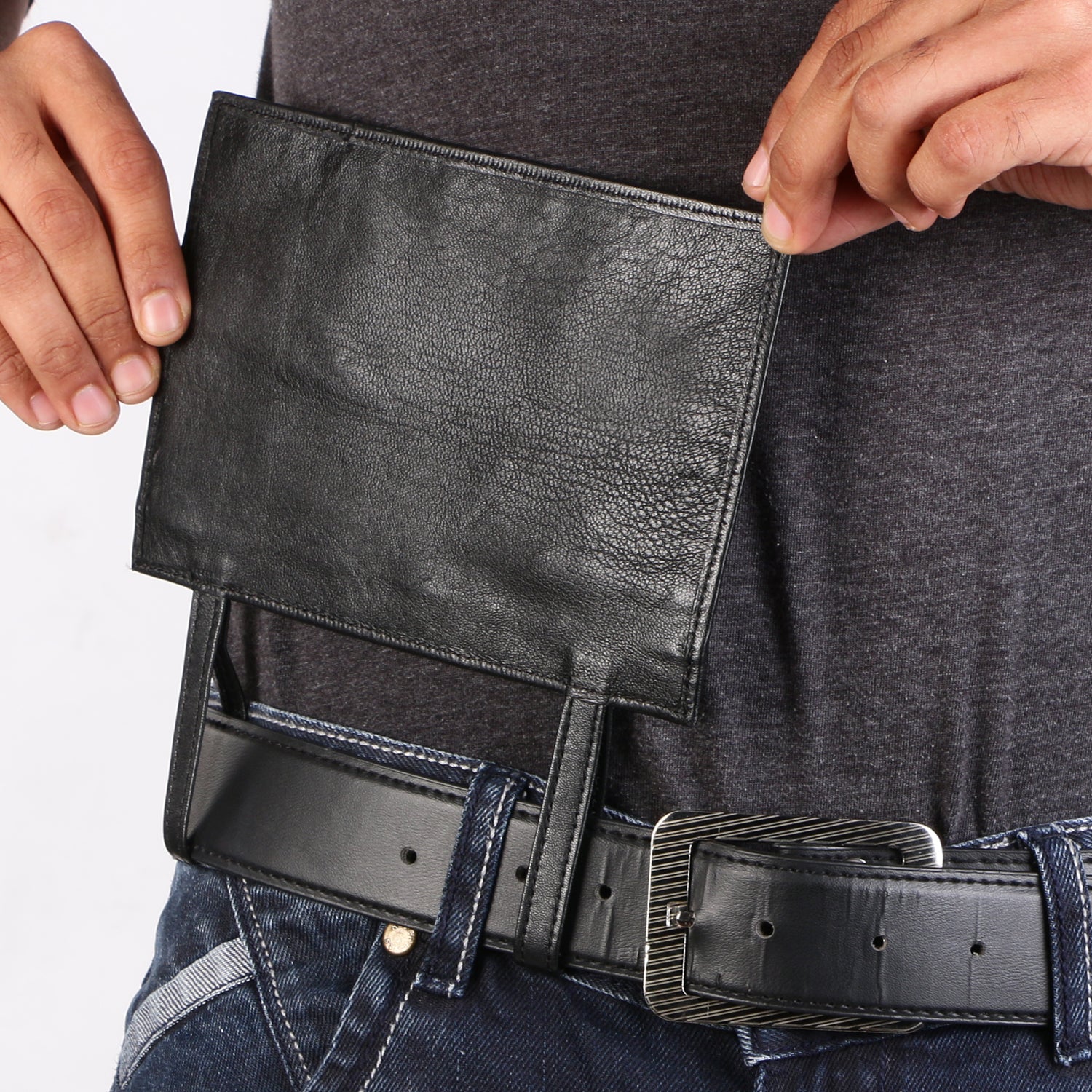 backside image of GYPSY PROOF WALLET.  The model is holding wallet upside down