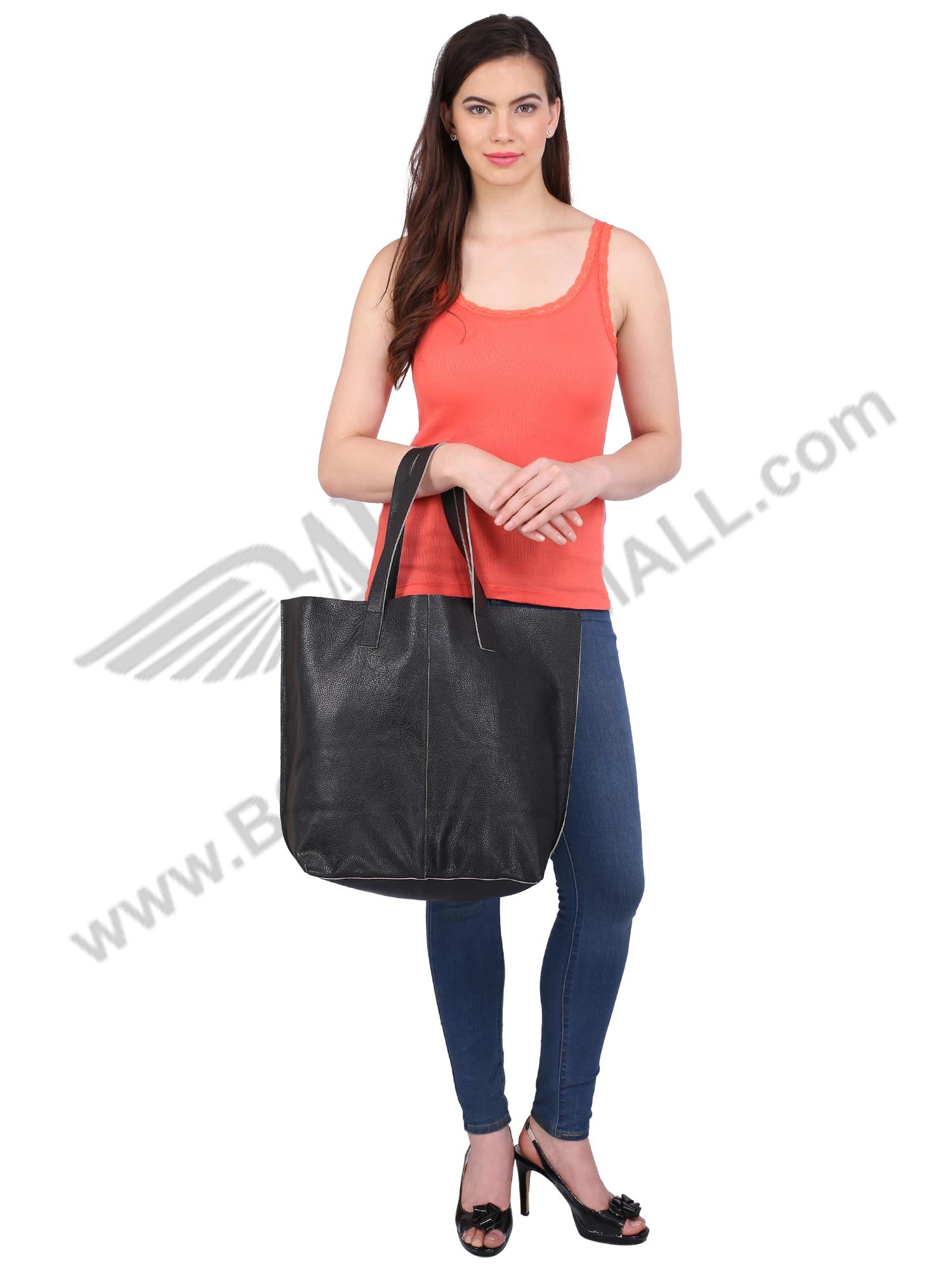 a model posing with  a black LUFT SHOPPING BAG