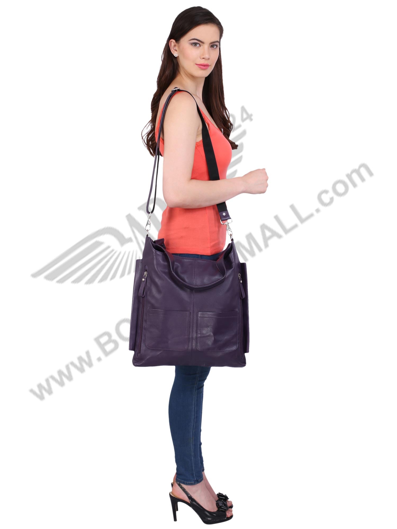 Model posing with purple FER GAMO HAND BAG
