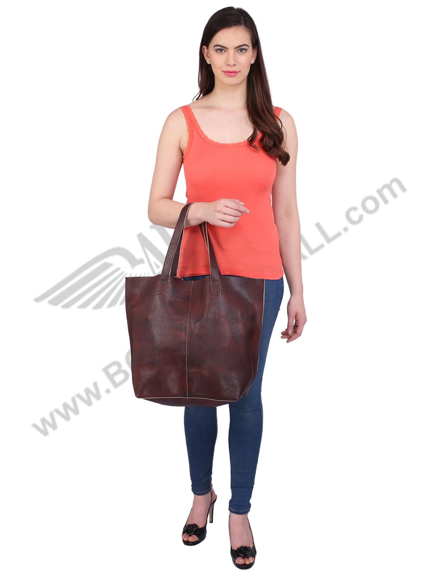 Front view of model posing with brown LUFT SHOPPING BAG