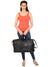 Model posing with CARRY ON TOTE SAA-SMALL