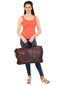 Model posing with brown CARRY ON TOTE SAA MEDIUM SIZE